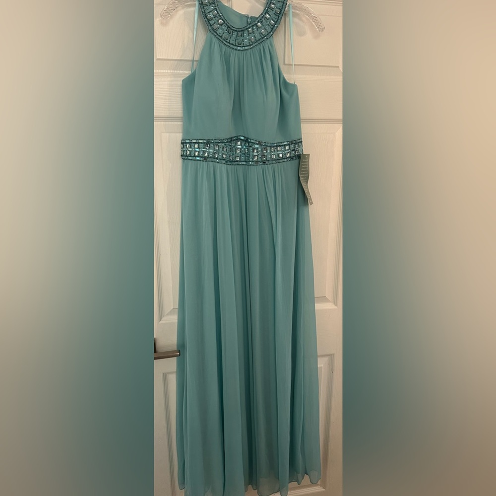 Formal Halter A-line dress with  beading. Light teal color. New with tag sz 12